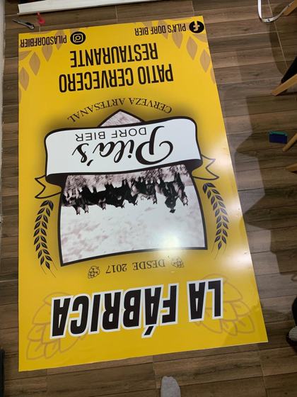 La Fábrica · cartel en vinilo impreso